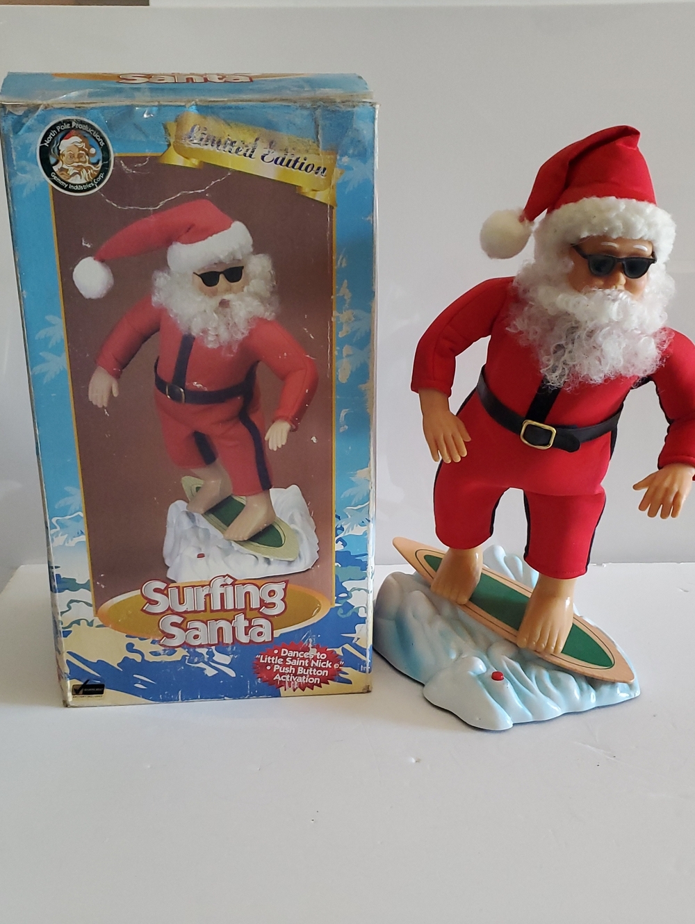 Surfing Santa Holiday Figurine - Red